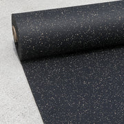Eggshell/Cocoa fleck 8mm Rubber Gym Roll rolled out on concrete.