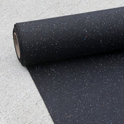 Roll of 2mm rubber underlayment on a gray surface