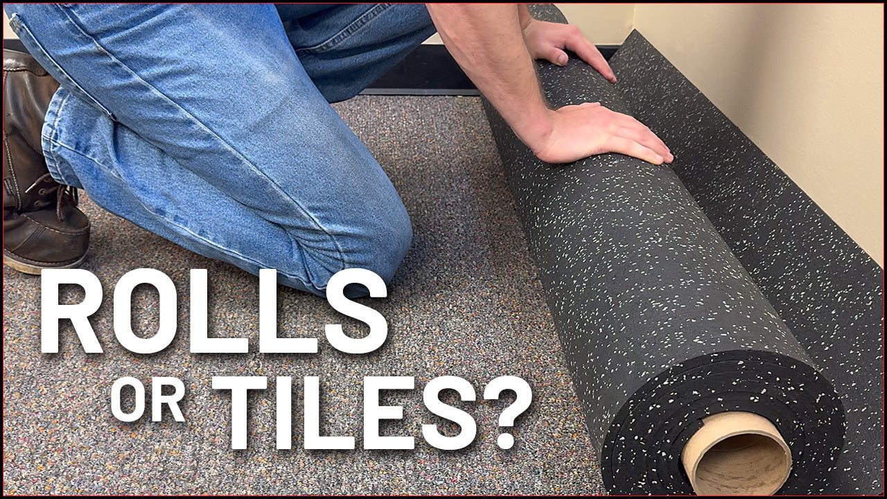 Person rolling out a rubber gym roll over low pile carpet. 