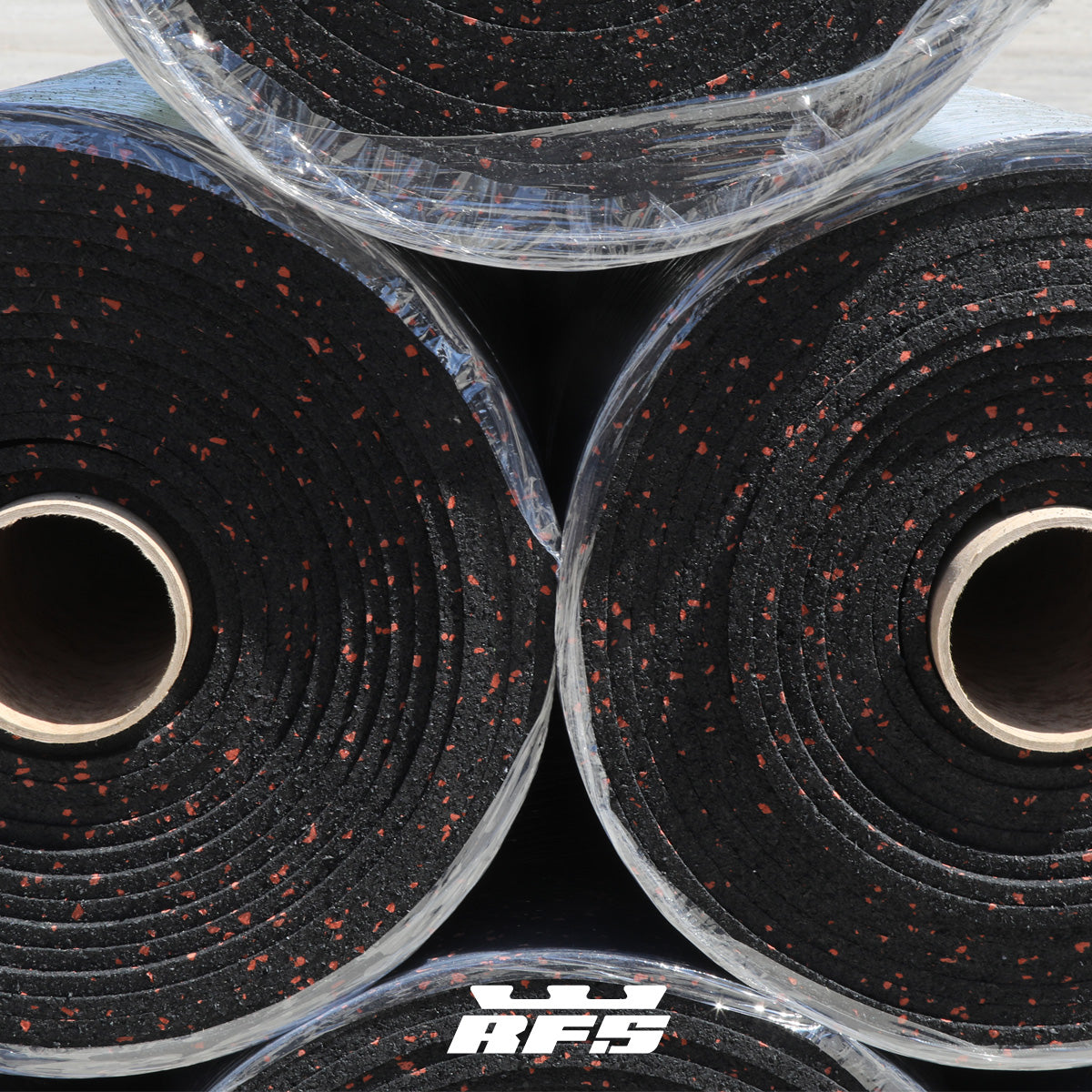 Black rubber rolls with red specks and 'RFS' branding stacked 