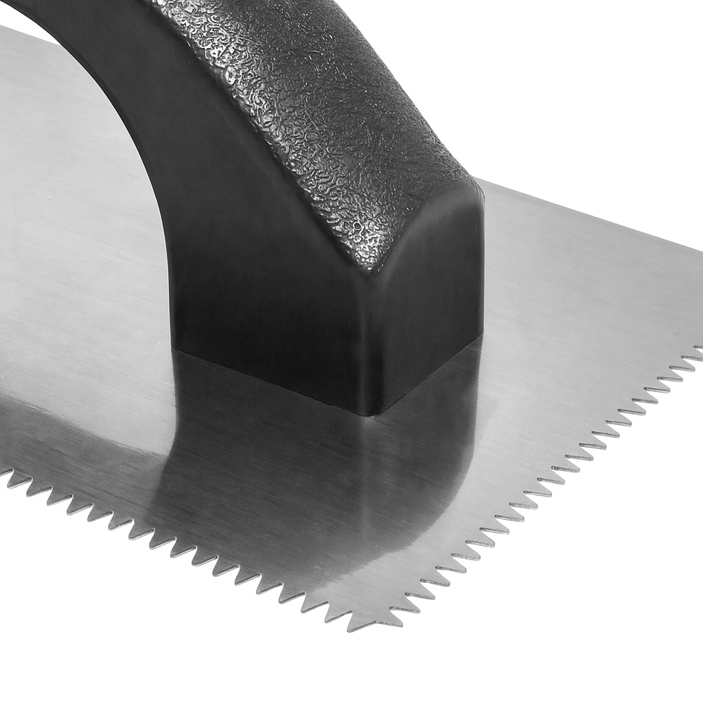 Close up view of trowel showing the detail of the v-notch.